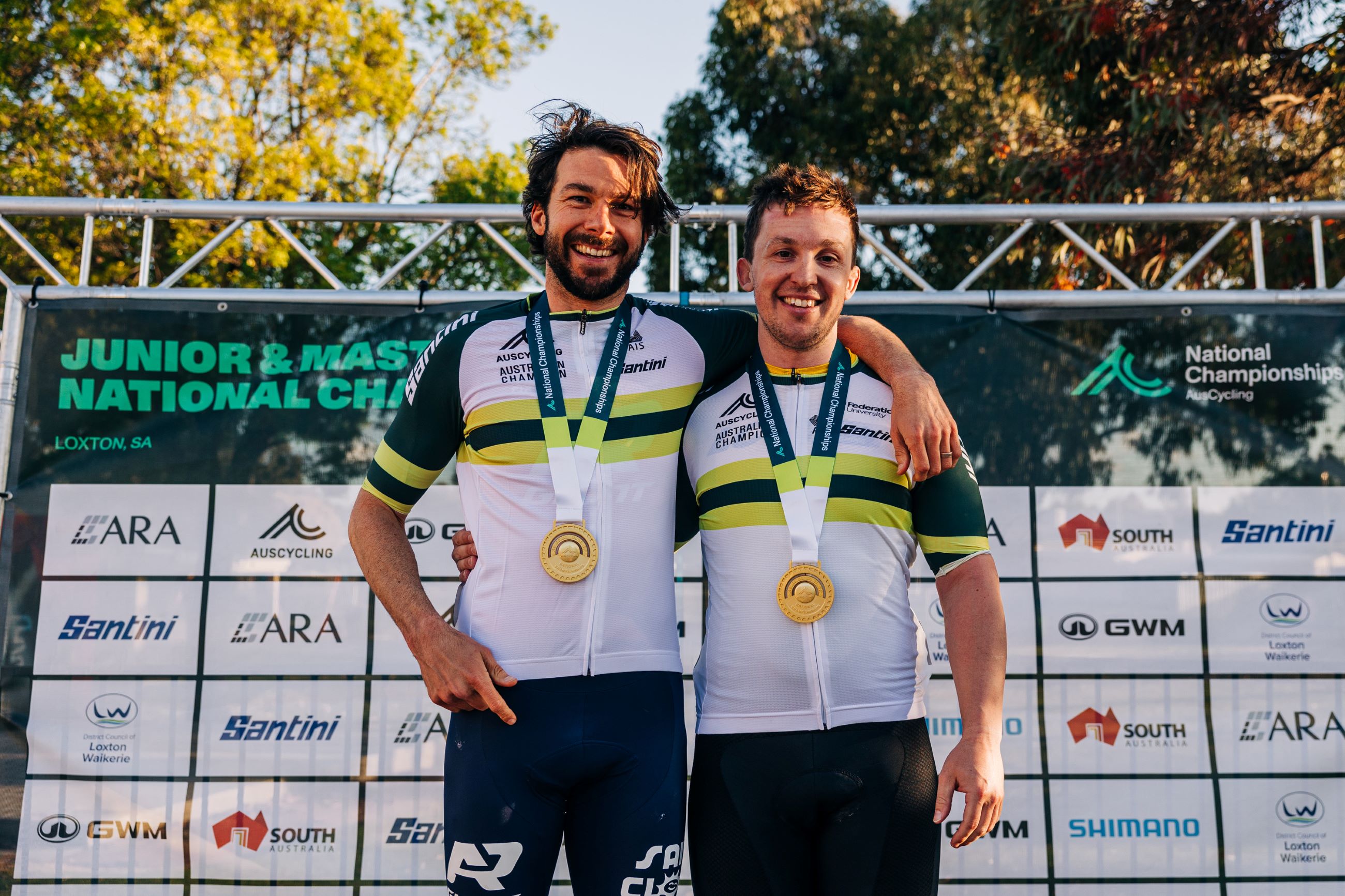 The winners of the men's masters 1 and 2 road race championships in green-and-gold jerseys of Australian champion at the 2024 AusCycling Masters & Junior Road National Championships in Loxton